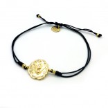 Adjustable cord bracelet with gold-plated charms